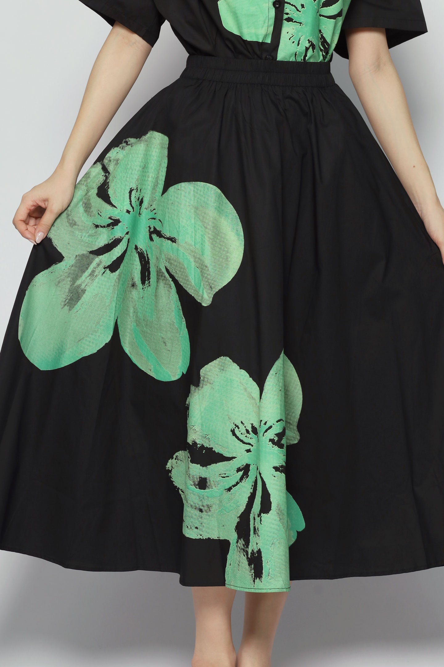 Cheong 2 in 1 Top and Skirt Set in Black